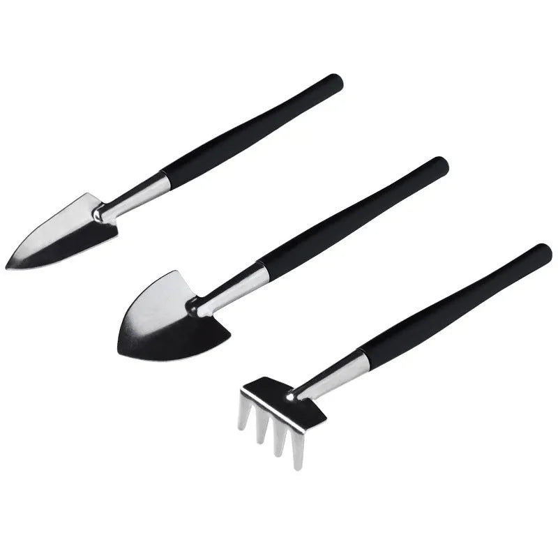 16-piece black succulent plant tools set showing scissors, tweezers, shovel, watering bottles, and gardening tools on work cushion