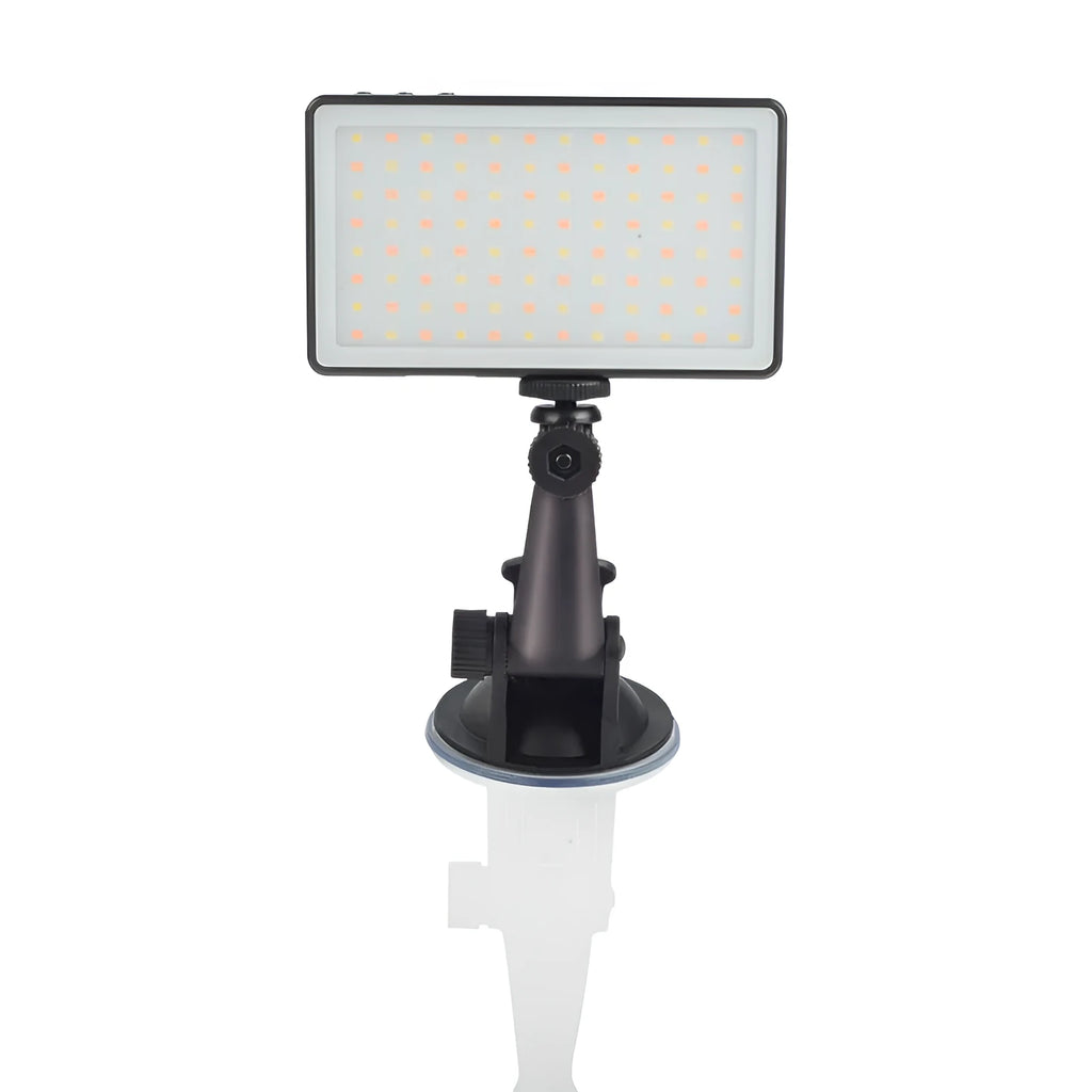 Black aluminium USB LED conference light with screen, shown next to a laptop for video calls.