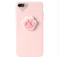 Soft pink silicone iPhone case with a raised 3D cartoon cat design on the back.
