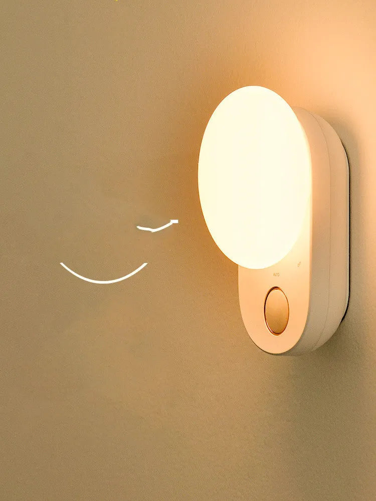 Baseus white rechargeable LED night light with motion sensor for bedroom bedside.