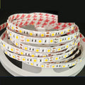 Close-up of flexible 2835 and 5050 SMD LED light strips showing dense and standard LED spacing.