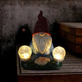 Solar LED resin dwarf doll outdoor ornament with faceless old man design measuring 27x20cm