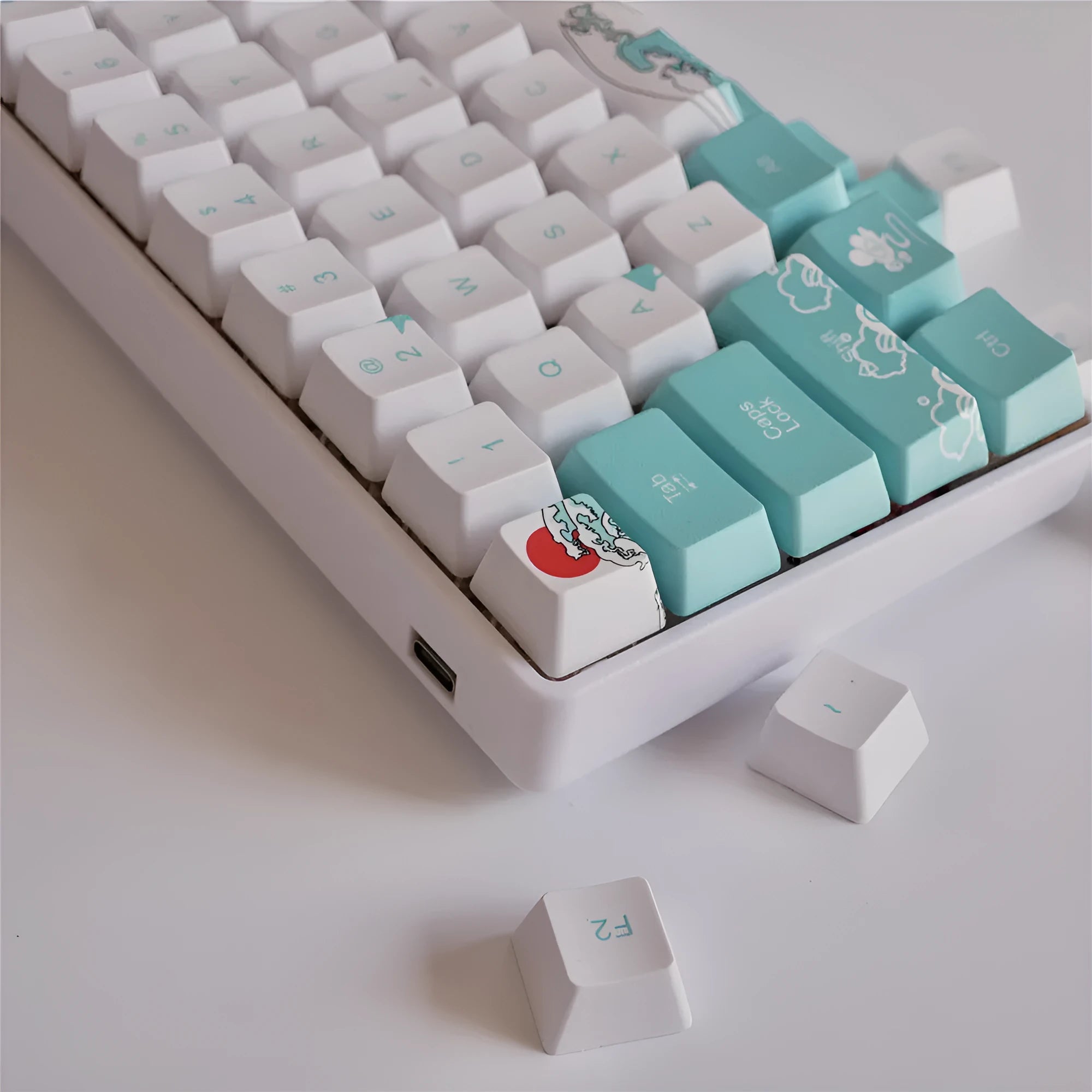 Coral Sea 108-key keycap set with wireless USB and multimedia keys on a mechanical keyboard