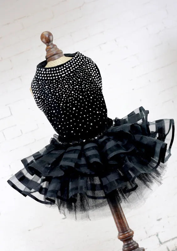 Black polyester princess-style dog skirt for small to large pets on white background