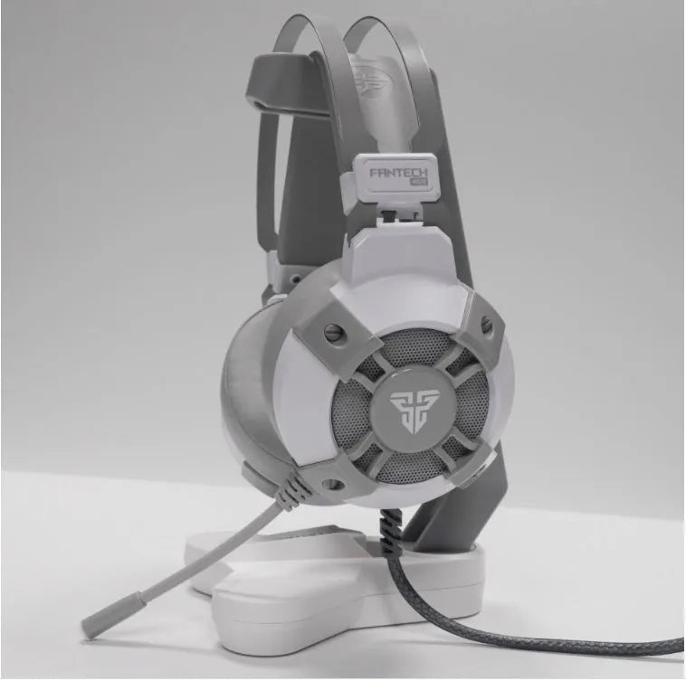 Black FANTECH HG11 USB gaming headset with large earcups, an adjustable microphone, and RGB lighting on the sides.