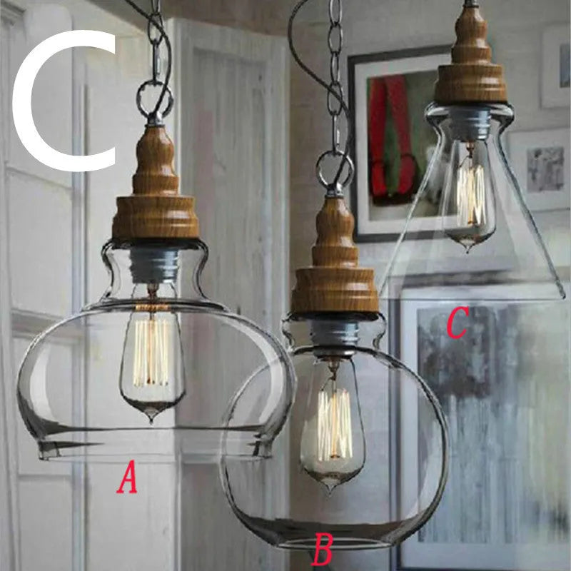 Glass single head pendant light with wood grain finish and adjustable height mechanism
