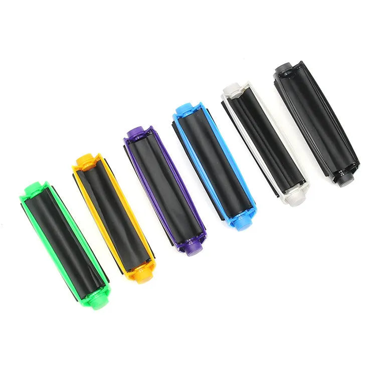 Manual plastic cigarette maker for shredded tobacco, shown in multiple colours with 110mm length.