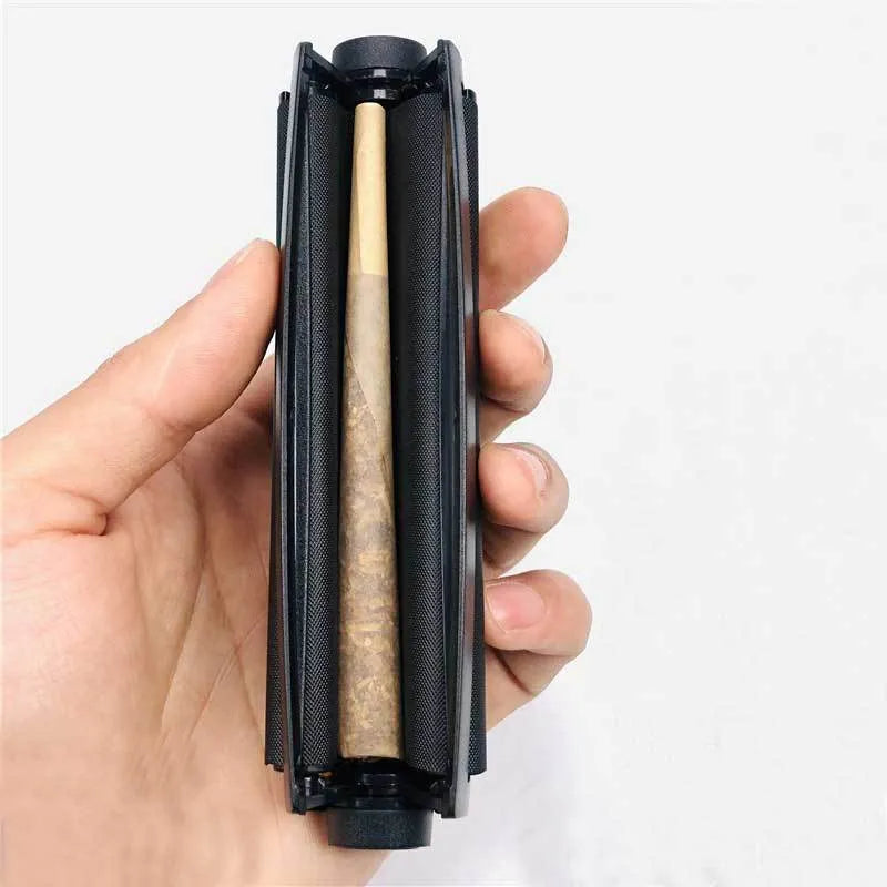 Manual plastic cigarette maker for shredded tobacco, shown in multiple colours with 110mm length.