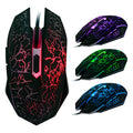 Black wired optical mouse with six buttons and four-way scroll wheel on a desk