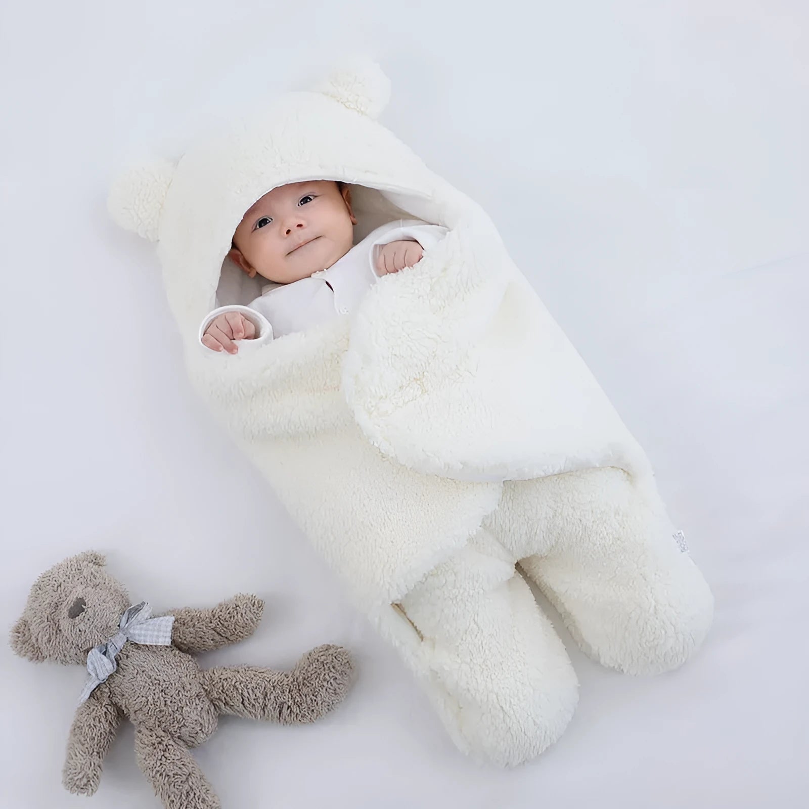 Cotton blend baby quilted sleeping bag wrapper shown in light blue colour