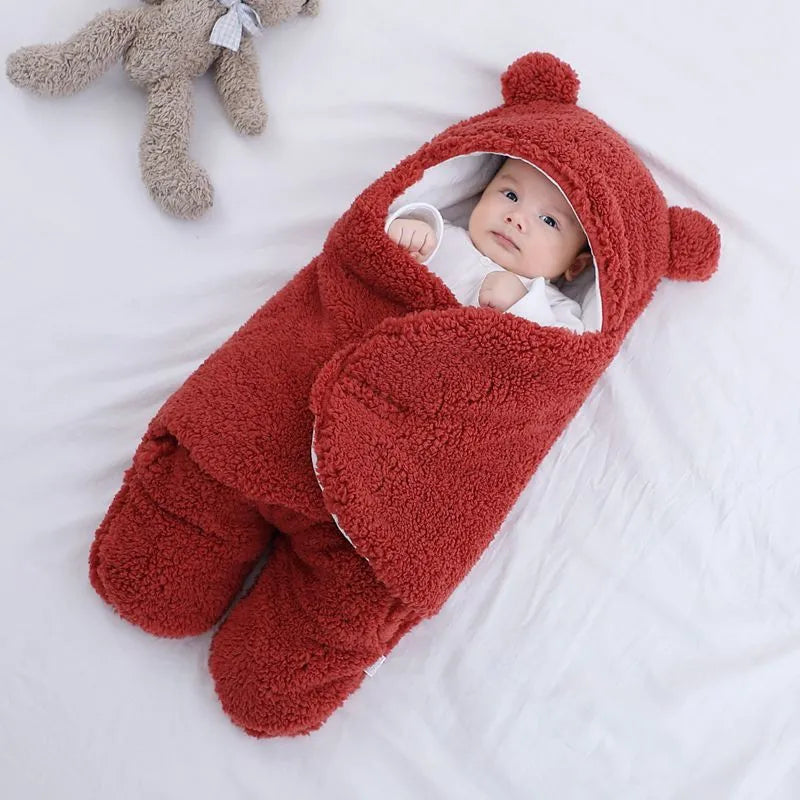 Cotton blend baby quilted sleeping bag wrapper shown in light blue colour