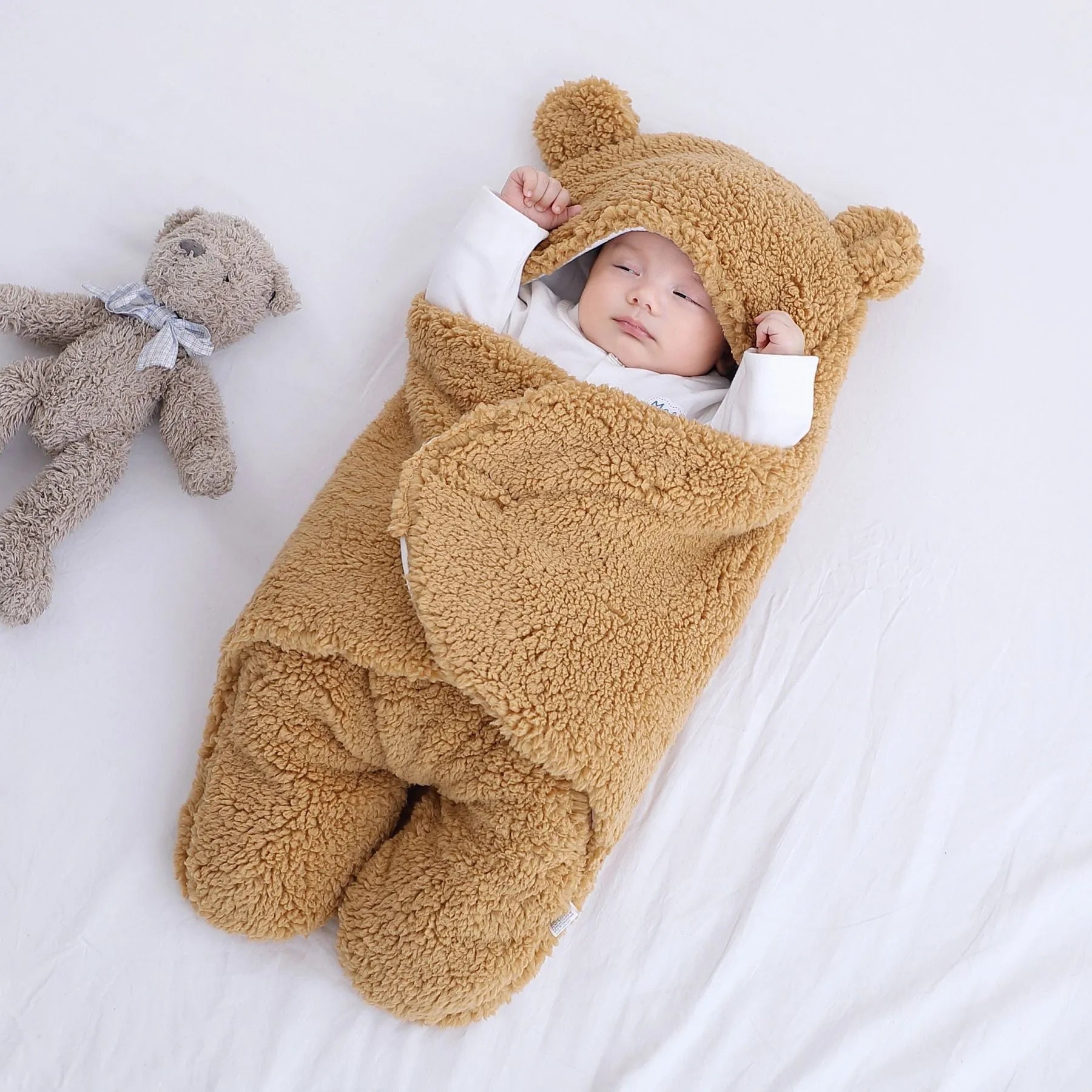 Cotton blend baby quilted sleeping bag wrapper shown in light blue colour