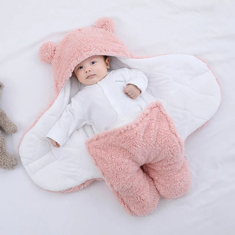 Cotton blend baby quilted sleeping bag wrapper shown in light blue colour