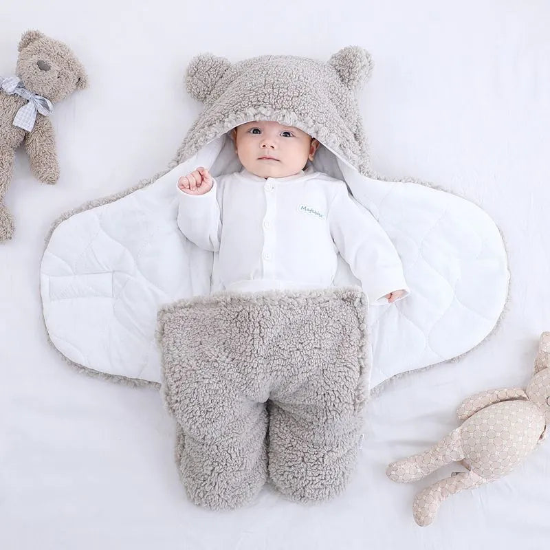 Cotton blend baby quilted sleeping bag wrapper shown in light blue colour