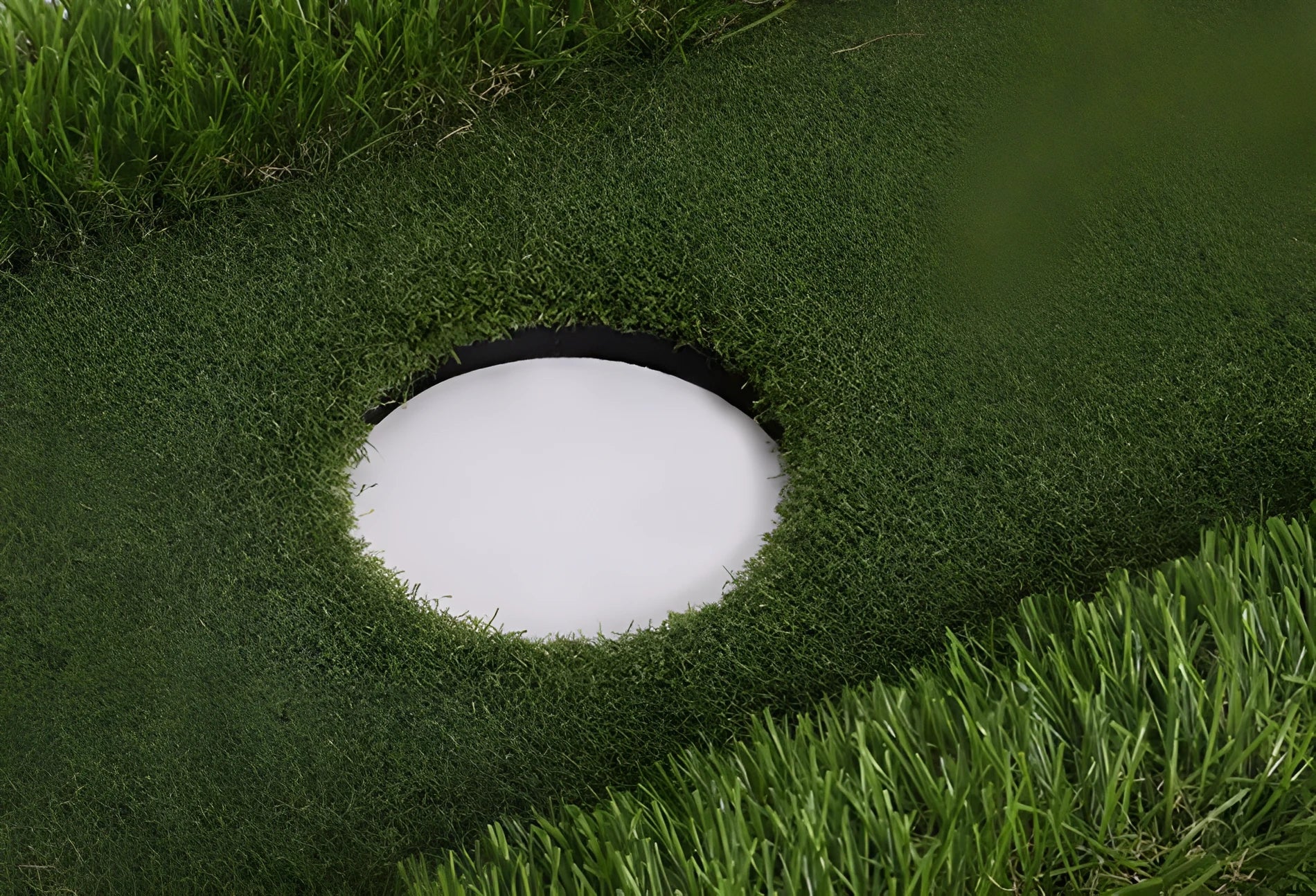 Green golf training mat with artificial grass surface and EVA foam base in rectangular shape