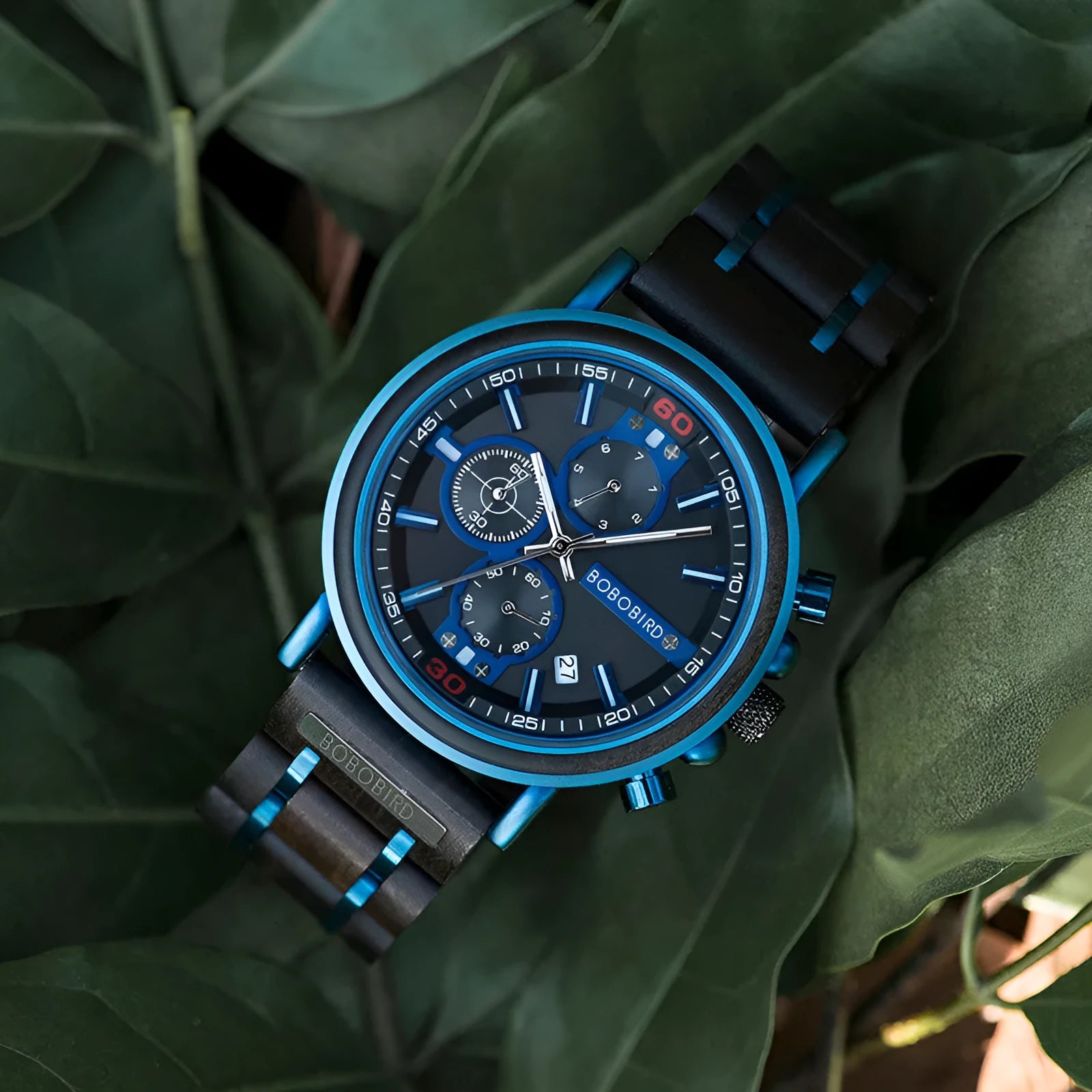 Men's wooden chronograph watch with round blue dial, wood strap, and mineral glass mirror