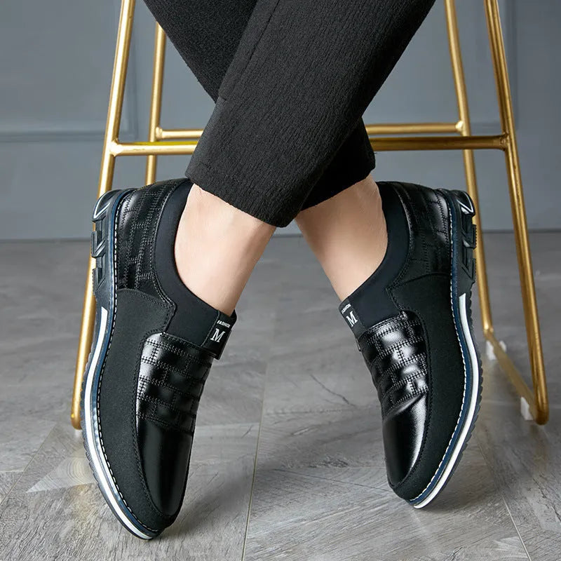 Men's low-cut casual leather shoes in blue, available in sizes 38 to 48 with a rubber sole.