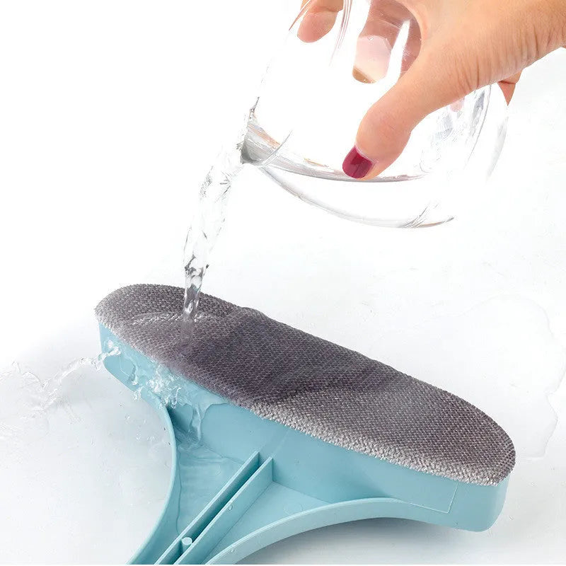 Blue double-sided window cleaning brush with a microfibre scraper on one side and a crevice brush attachment.
