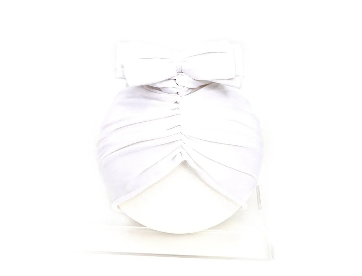Soft knitted acrylic baby girl hat in turban style for infants 0-28 months in various candy colours