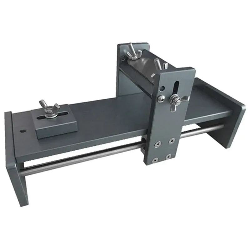 Fixed angle sharpening tool for woodworking planers and chisels on a workbench.