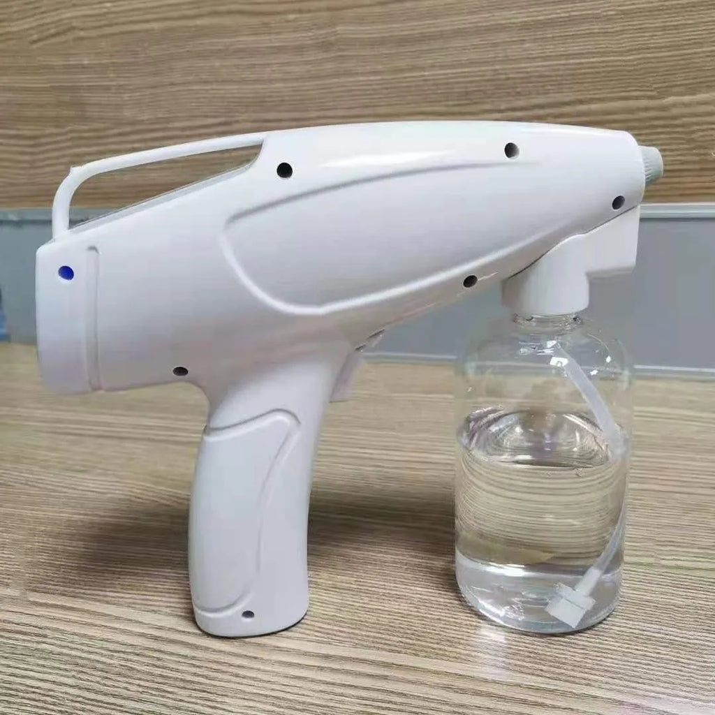 White handheld wireless electric spray disinfection gun with USB charging port