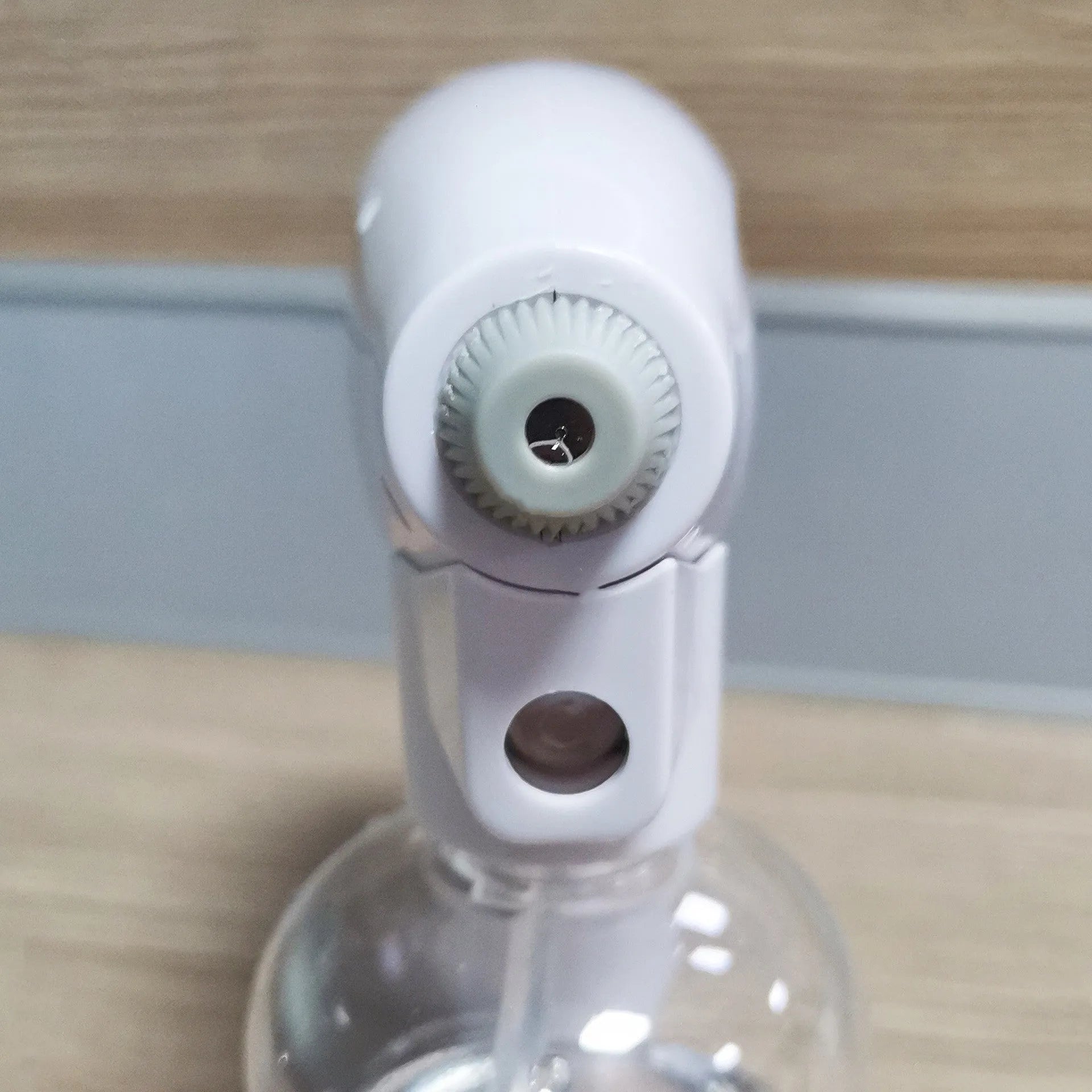 White handheld wireless electric spray disinfection gun with USB charging port