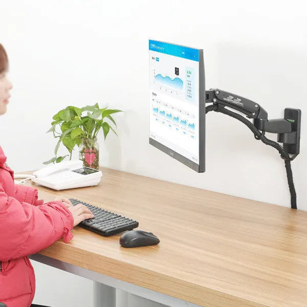 Black wall-mounted monitor stand with telescopic arm and VESA plate for 75-100mm mounting patterns