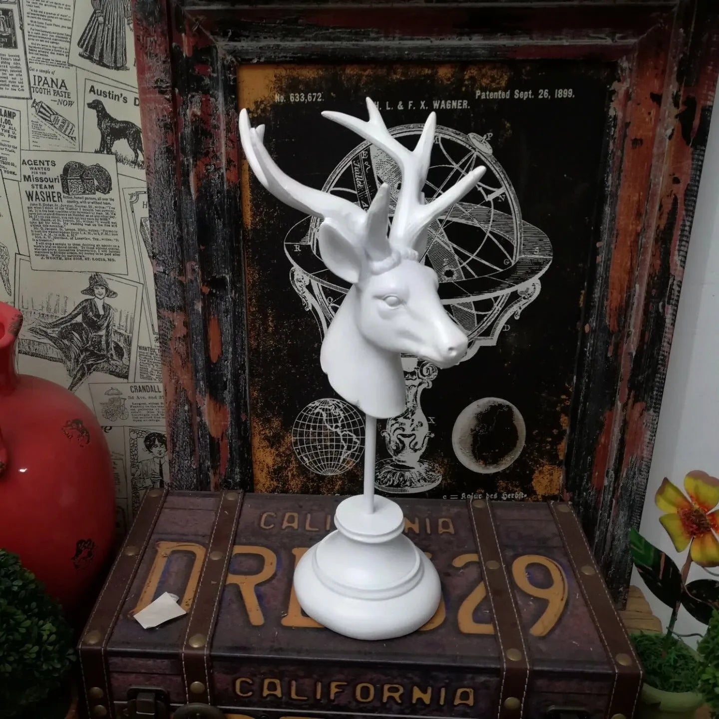 Natural resin animal sculpture home decoration in black, white, and wood colour, 32cm tall