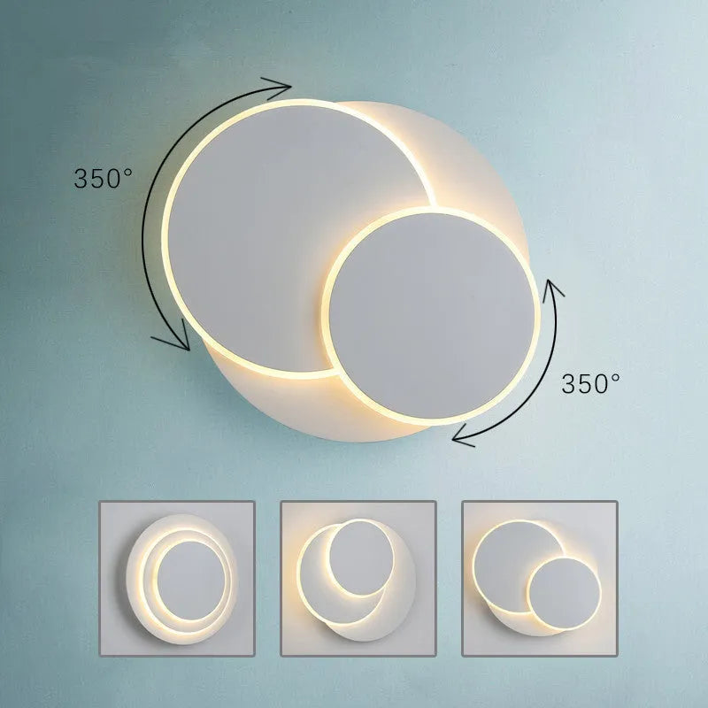 Modern round wall lamp in black or white with acrylic shade, shown in three sizes: 22cm, 18cm, and 14cm diameter.