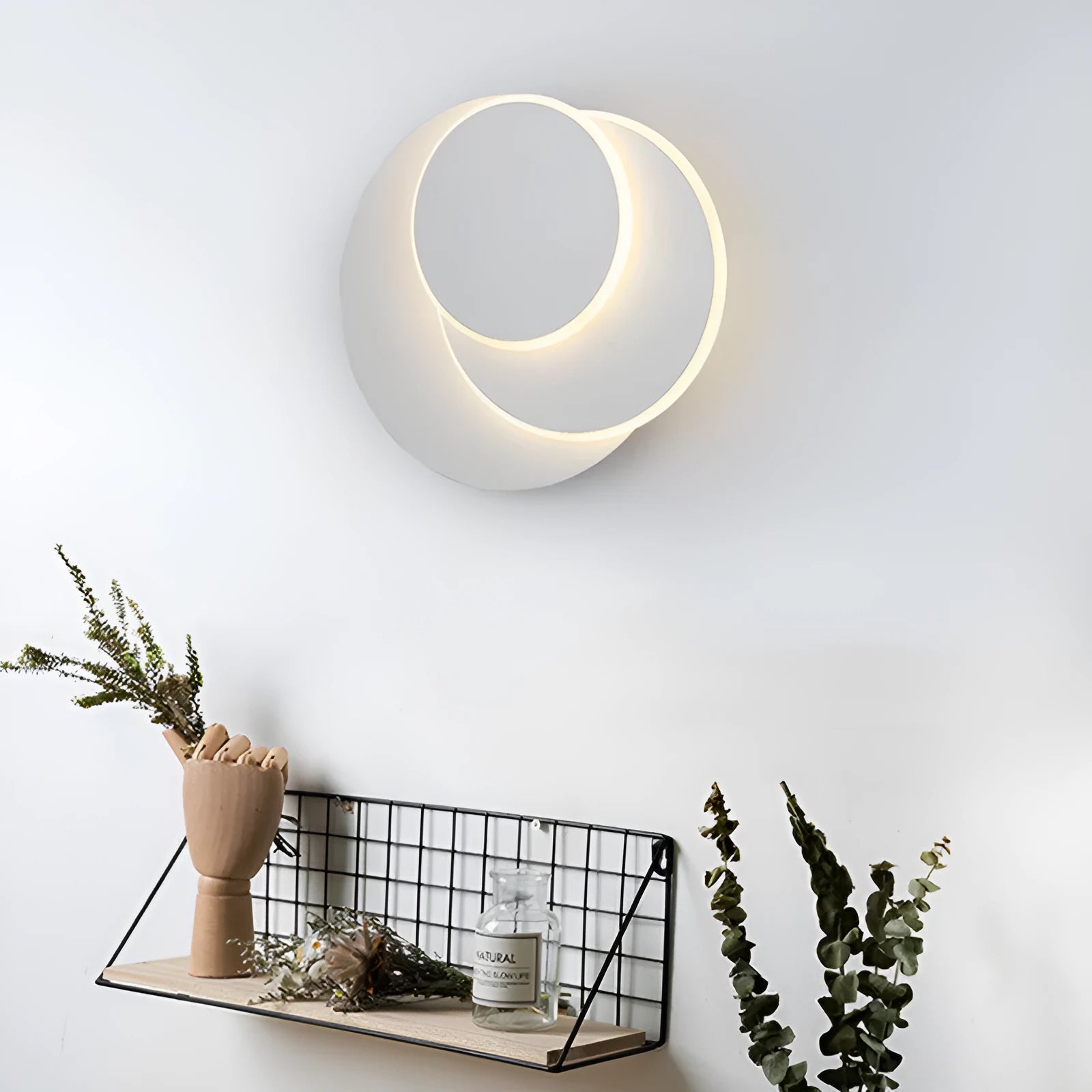 Modern round wall lamp in black or white with acrylic shade, shown in three sizes: 22cm, 18cm, and 14cm diameter.