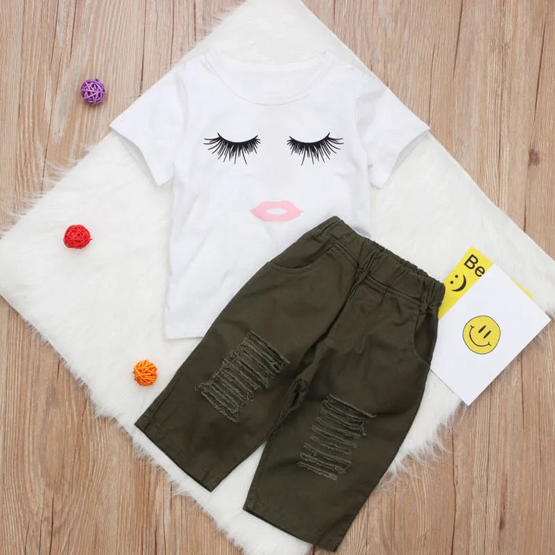 Pudcoco white girl set with eyelash short sleeve top and ripped trousers on child model