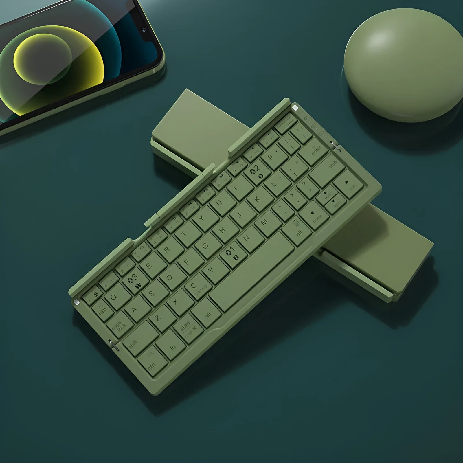 Silver white foldable Bluetooth keyboard open with tablet on stand and closed for pocket storage