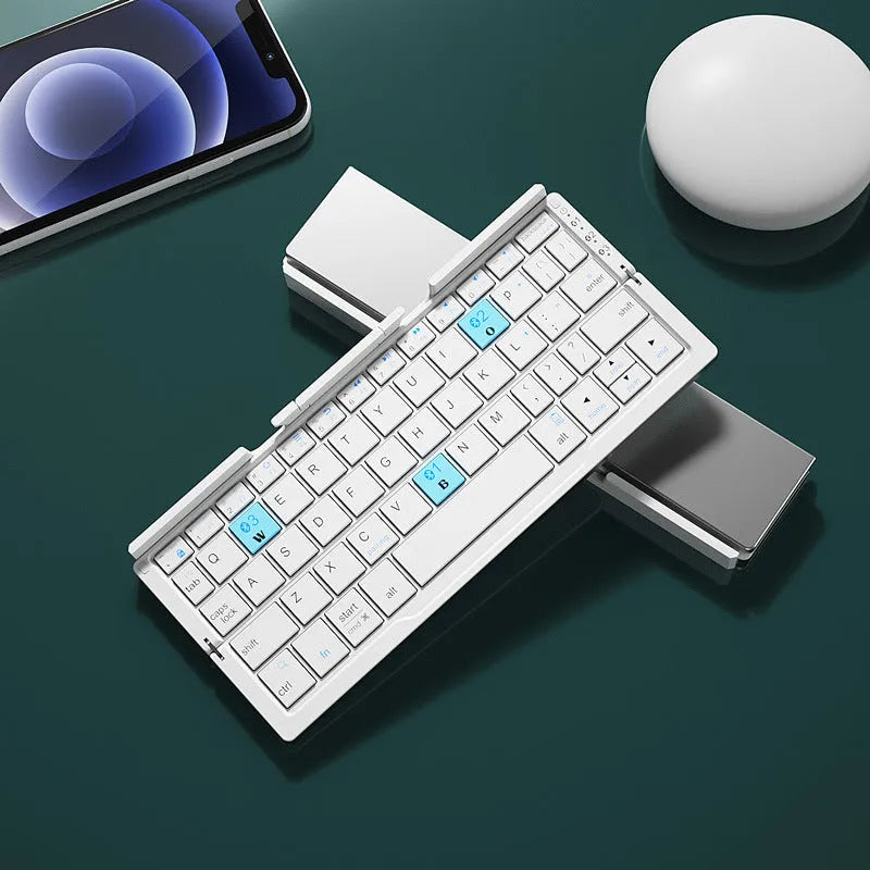 Silver white foldable Bluetooth keyboard open with tablet on stand and closed for pocket storage