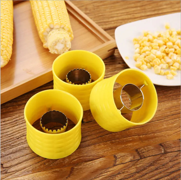 Yellow manual corn thresher kitchen gadget with corn-shaped PP handle.