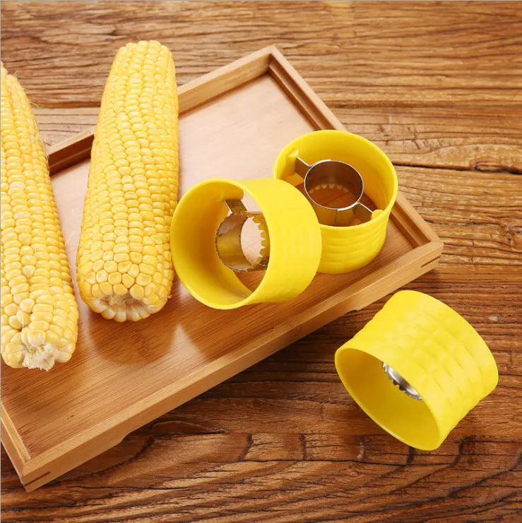 Yellow manual corn thresher kitchen gadget with corn-shaped PP handle.