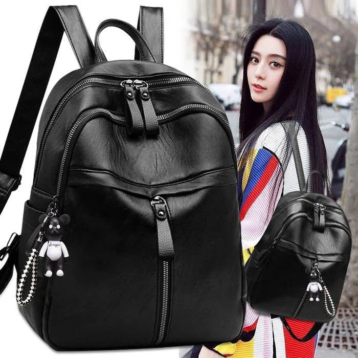 Black soft PU leather backpack with large 35L capacity and double straps