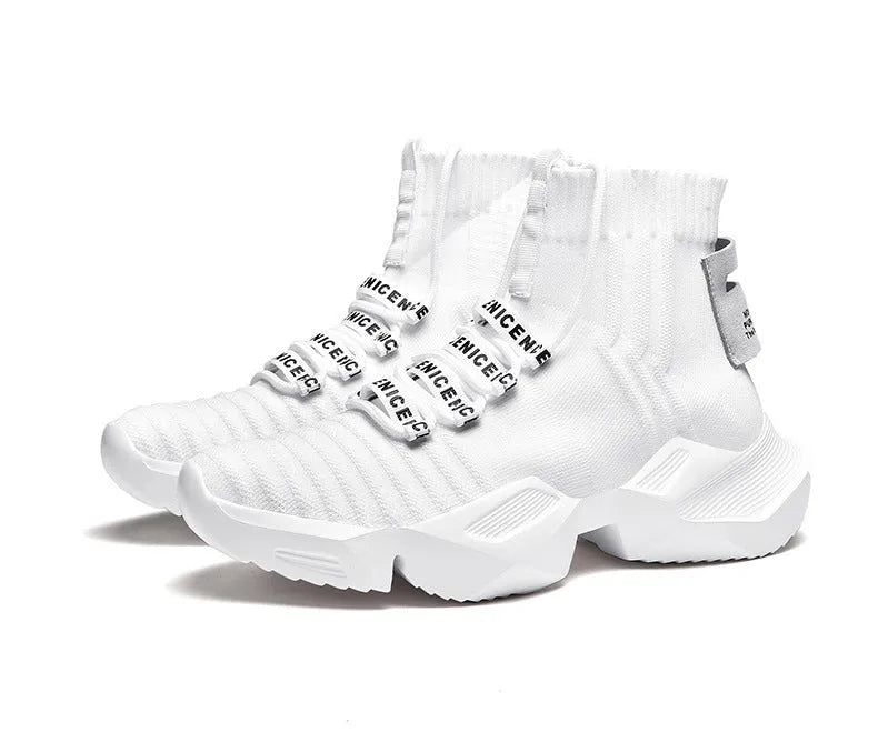 Men's black and white casual sports shoes with mesh lining, shown in large sizes.