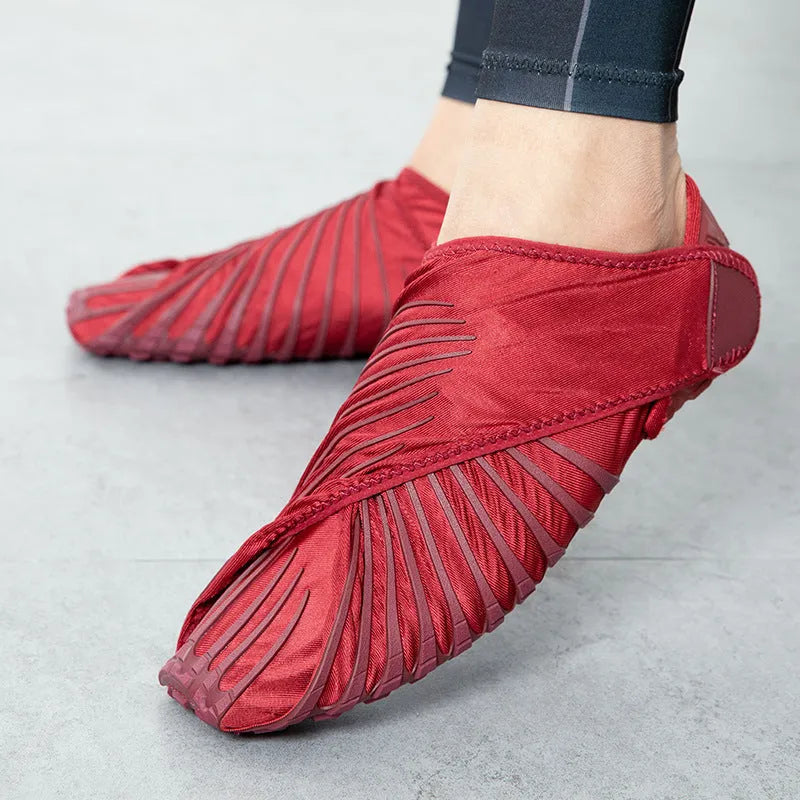 Pair of unisex fitness treadmill shoes with black elastic waterproof cloth upper and KPU outsole, flat heel, low cut design