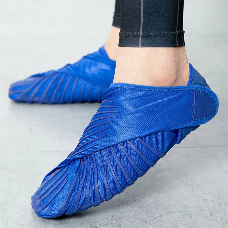 Pair of unisex fitness treadmill shoes with black elastic waterproof cloth upper and KPU outsole, flat heel, low cut design