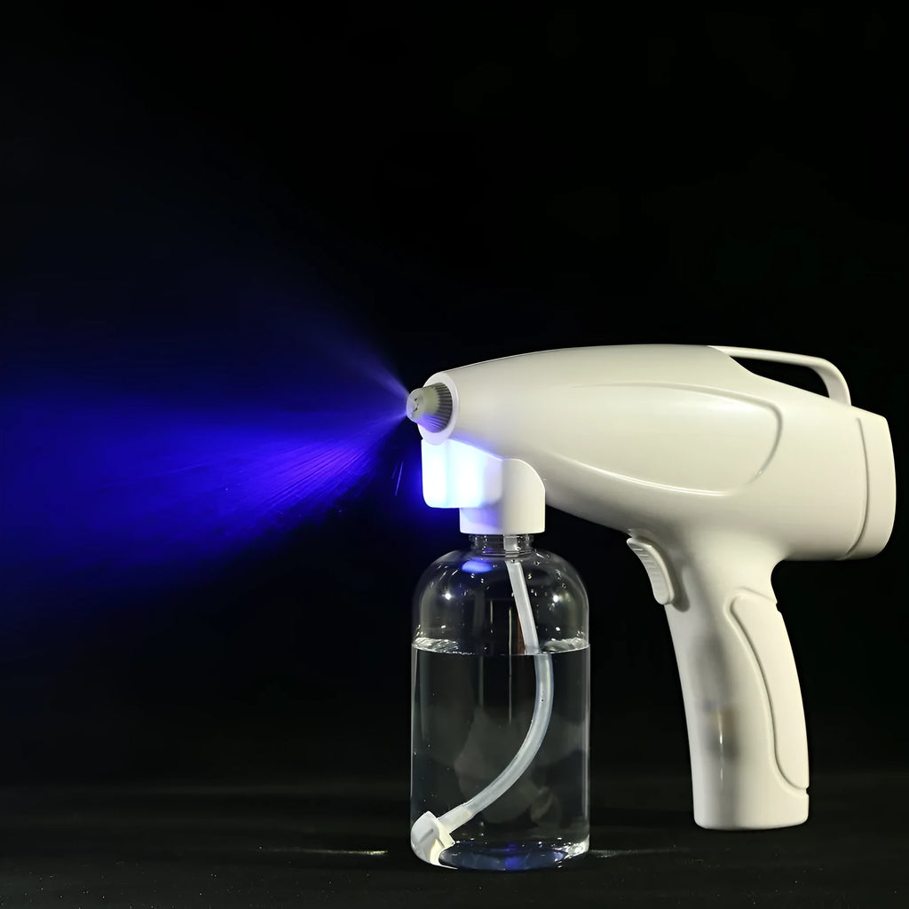 White handheld wireless electric spray disinfection gun with USB charging port