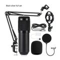 BM800 condenser microphone kit with sound card, metal shock mount, and pop filter on a desk