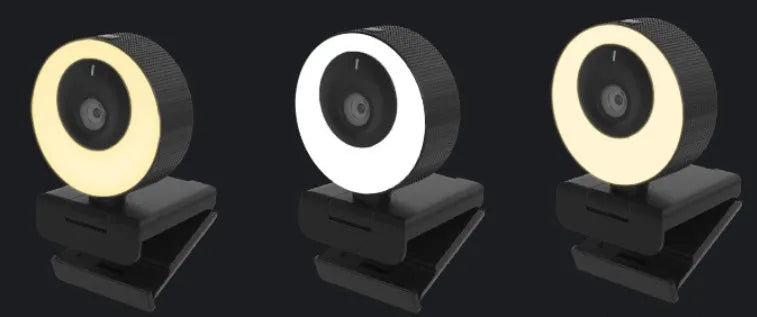 Black USB webcam with a magnetic privacy cover on a laptop, showing its compact ABS design.