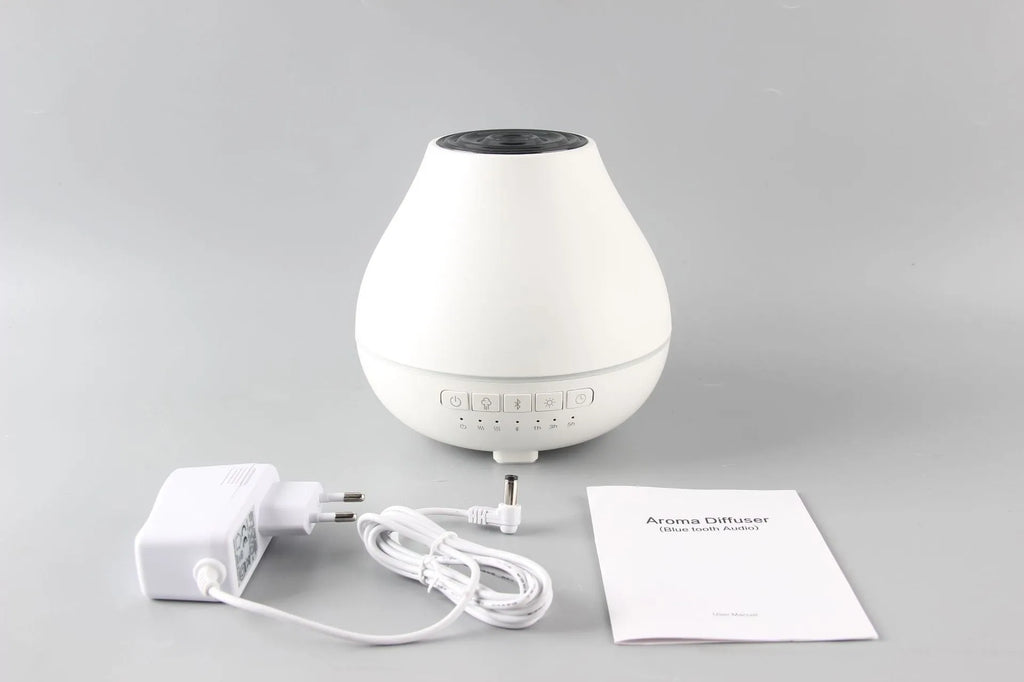 White circular Bluetooth humidifier aroma diffuser with essential oil fragrance function