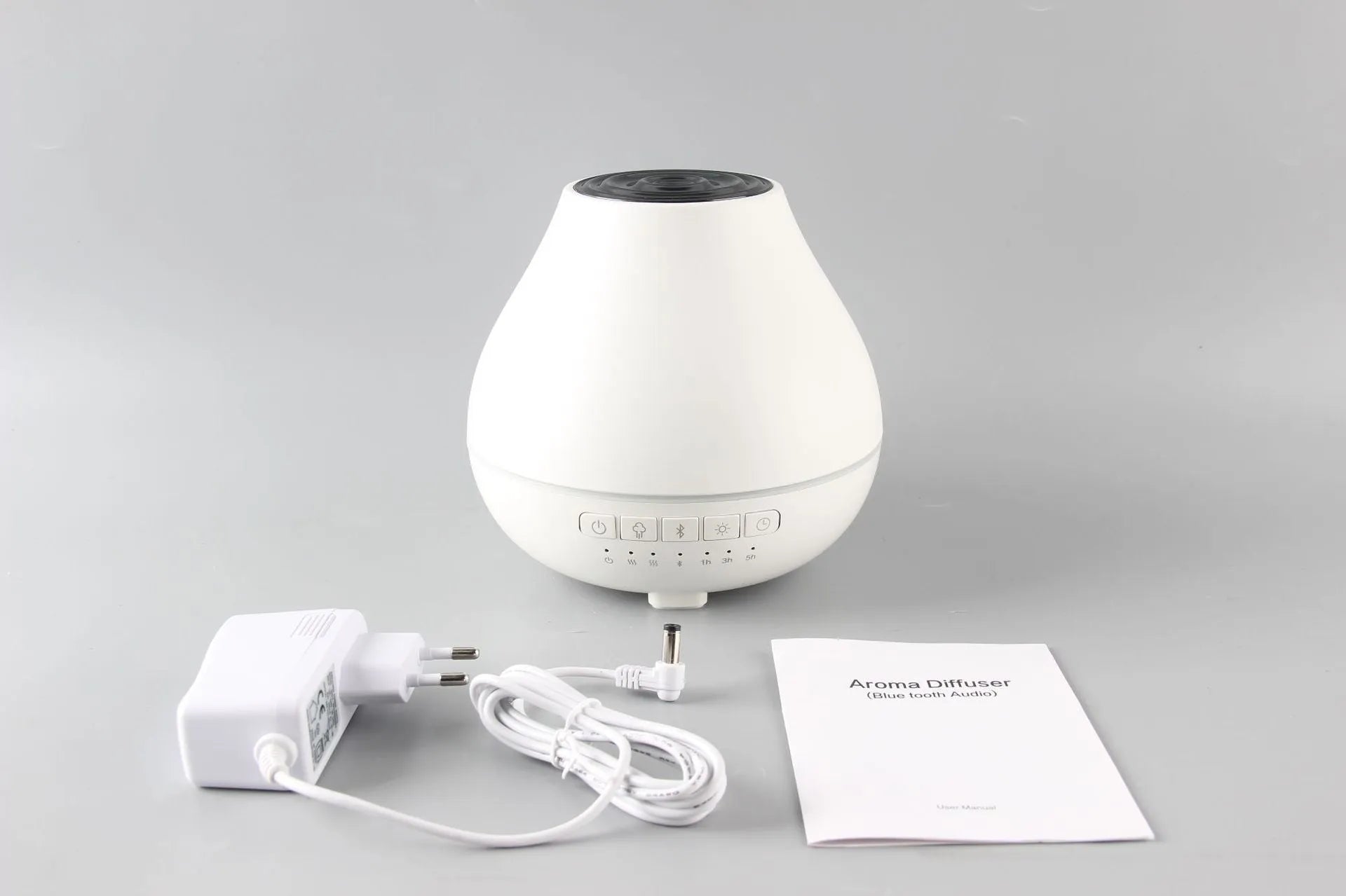 White circular Bluetooth humidifier aroma diffuser with essential oil fragrance function