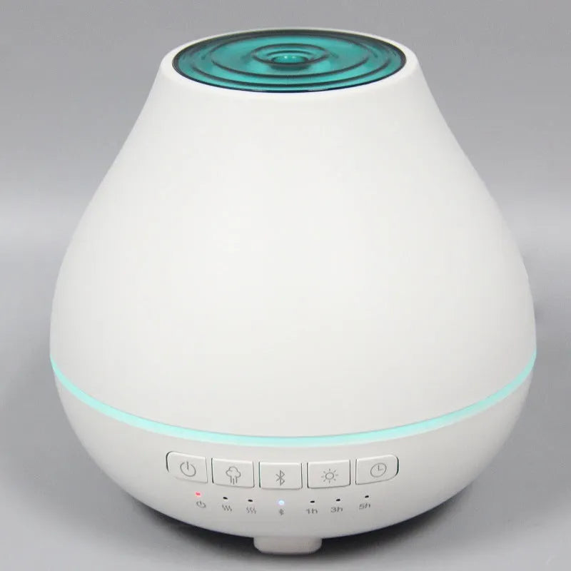 White circular Bluetooth humidifier aroma diffuser with essential oil fragrance function