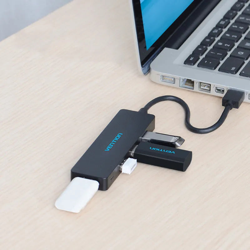 Black four-port USB 3.0 hub splitter with 0.15 metre cable and nickel-plated connectors