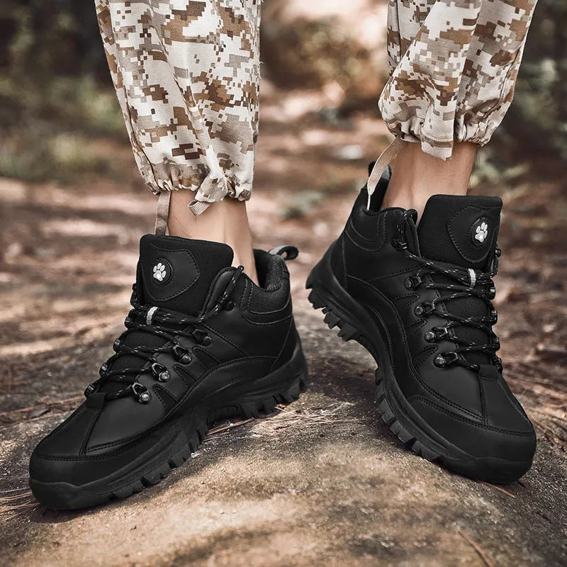 Men's military hiking boots in black with PU upper, rubber sole, low-tube design, and car suture detailing