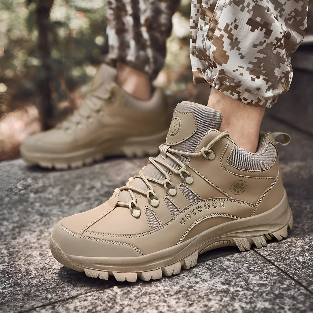 Men's military hiking boots in black with PU upper, rubber sole, low-tube design, and car suture detailing