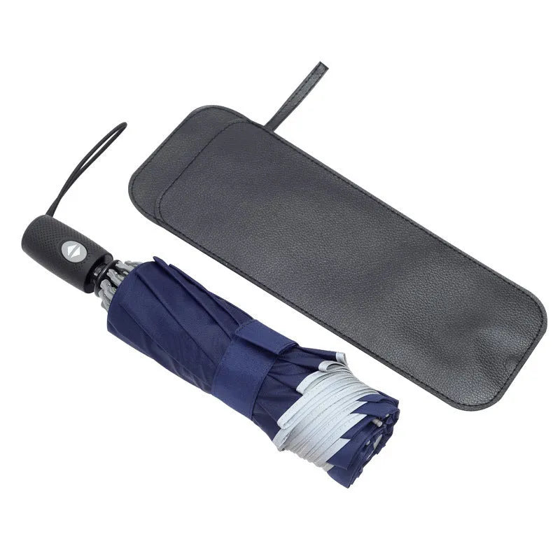 Black automatic reverse umbrella showing three-fold design with non-slip plastic handle