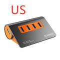 Dark grey aluminium USB-C hub with orange accents showing four USB 3.1 ports and detachable cable